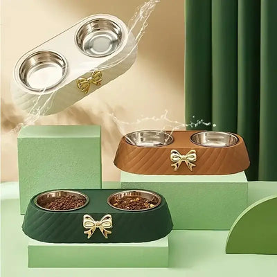 Product Description: Elevate your pet’s mealtime with the stylish and functional Bowtie Double Bowl Pet Food & Water Station. Designed with a charming bowtie-shaped base, this dual-bowl setup keeps food and water conveniently side by side, making feeding
