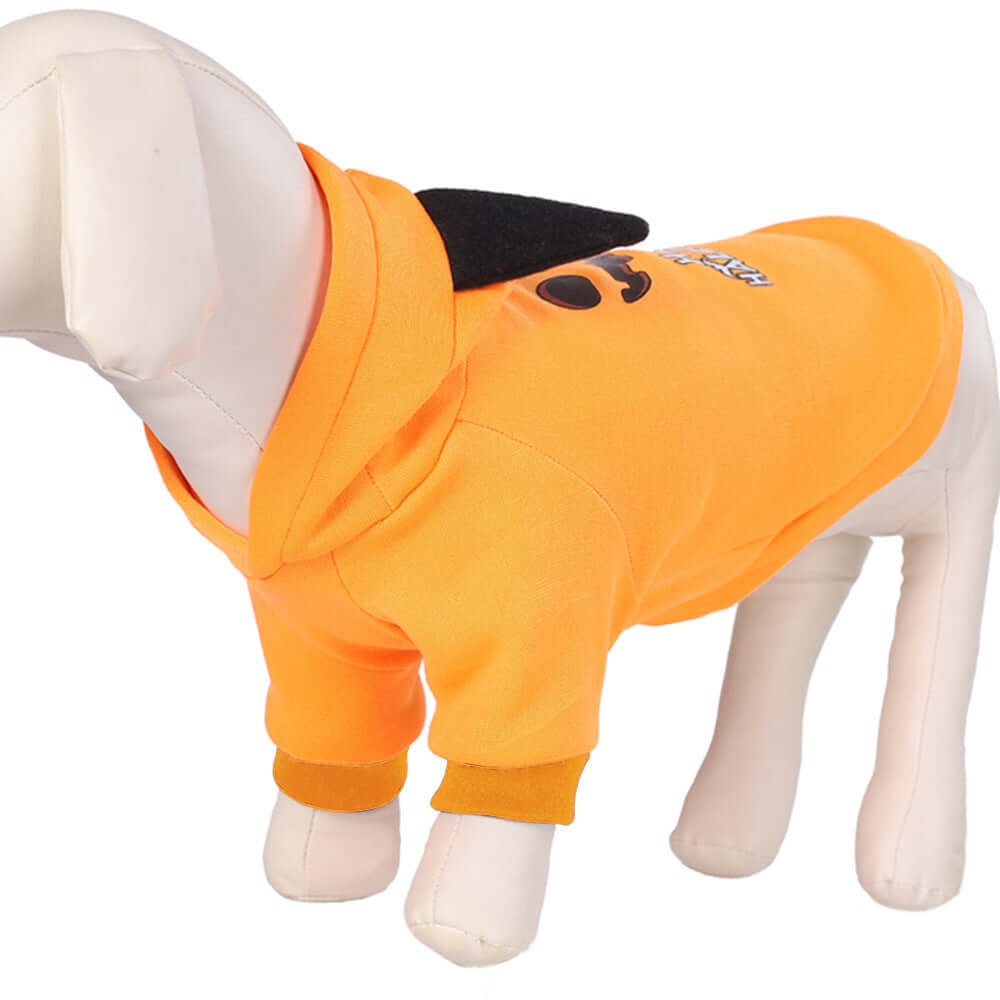 Dog mannequin wearing orange casual cloth pet hoodie with black detailing.