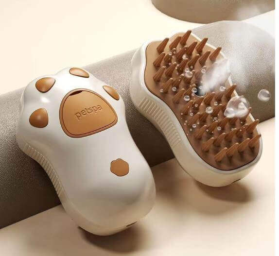 Innovative cat steam brush for easy grooming with detangling and hydrating features, shown with steam to reduce shedding.