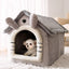 House Type Universal Removable and Washable Pet Dog Cat Bed Pet Supplies, M with a small dog inside a cute pet house.
