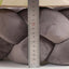 Close-up of soft knit cat and dog bed with plush fabric, measuring approximately 9 cm in height.