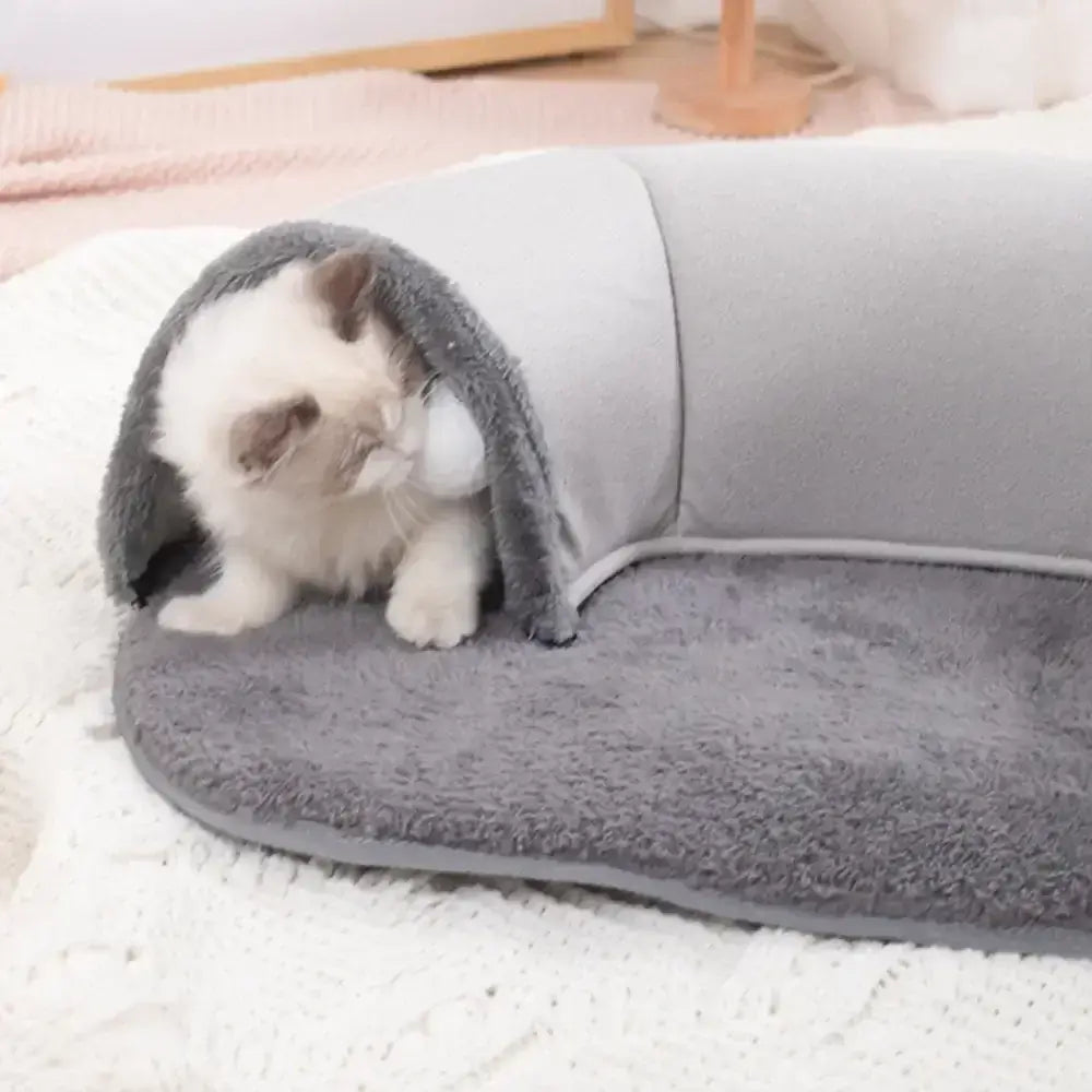 Discover the ultimate multifunctional cat toy! This interactive pet cat tunnel also serves as a bed, house, and training toy. Perfect for playful kittens.