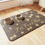 Splash-proof pet feeding mat with diatom mud, featuring non-slip surface and modern design for cats and dogs, with bowls on top.