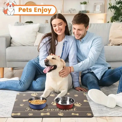 Couple with a dog using a pet feeding mat with bowls on top, designed for splash-proof and non-slip functionality.