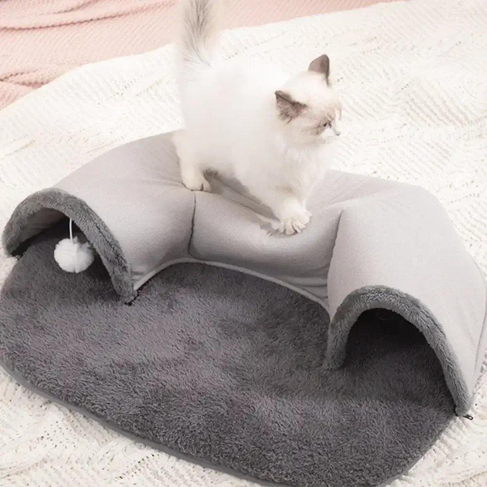 Discover the ultimate multifunctional cat toy! This interactive pet cat tunnel also serves as a bed, house, and training toy. Perfect for playful kittens.