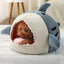 Shark Cat Bed - Cozy Hideaway for CatsPlush Shark Cat Bed for a fun & cozy retreat. Perfect comfort for your feline friend's naptime adventures. Shop now!£22.9