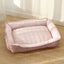 Summer cool dog cat kennel in pink with striped edges, soft padding, and machine washable fabric.