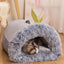 Cozy pet house bed with plush interior; cat relaxing in semi-enclosed design, perfect for warmth and security.