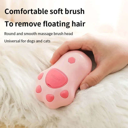 Hand using a pink soft massage brush on pet fur, ideal for removing floating hair, suitable for cats and dogs.